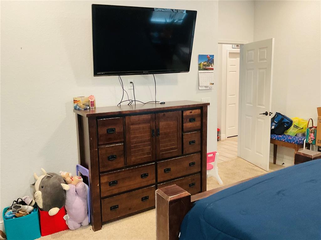 515 5th Street South Dundee, FL 33838 - Photo 33 of 74 a living room with furniture and a flat screen tv