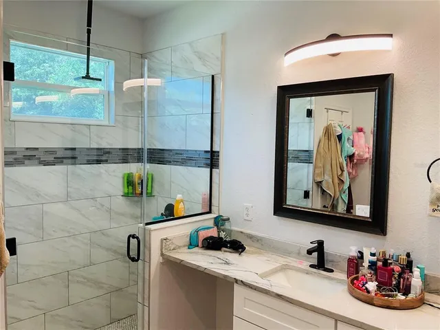 a view of a room with furniture and toys