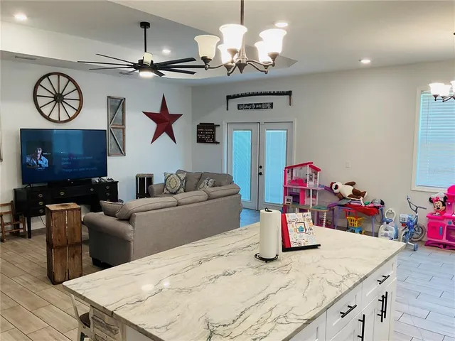 a bath room with a sink and a mirror
