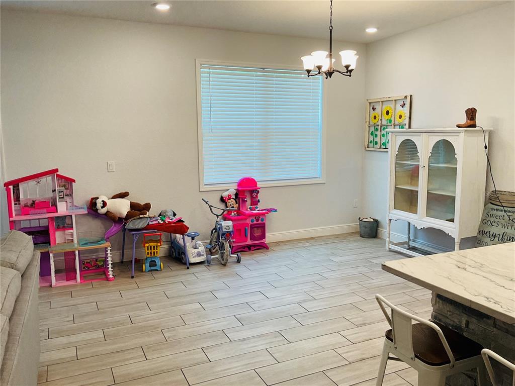515 5th Street South Dundee, FL 33838 - Photo 57 of 74 a view of a room with furniture and toys