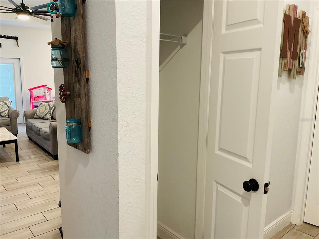 515 5th Street South Dundee, FL 33838 - Photo 65 of 74 a utility room with closet dryer and washer