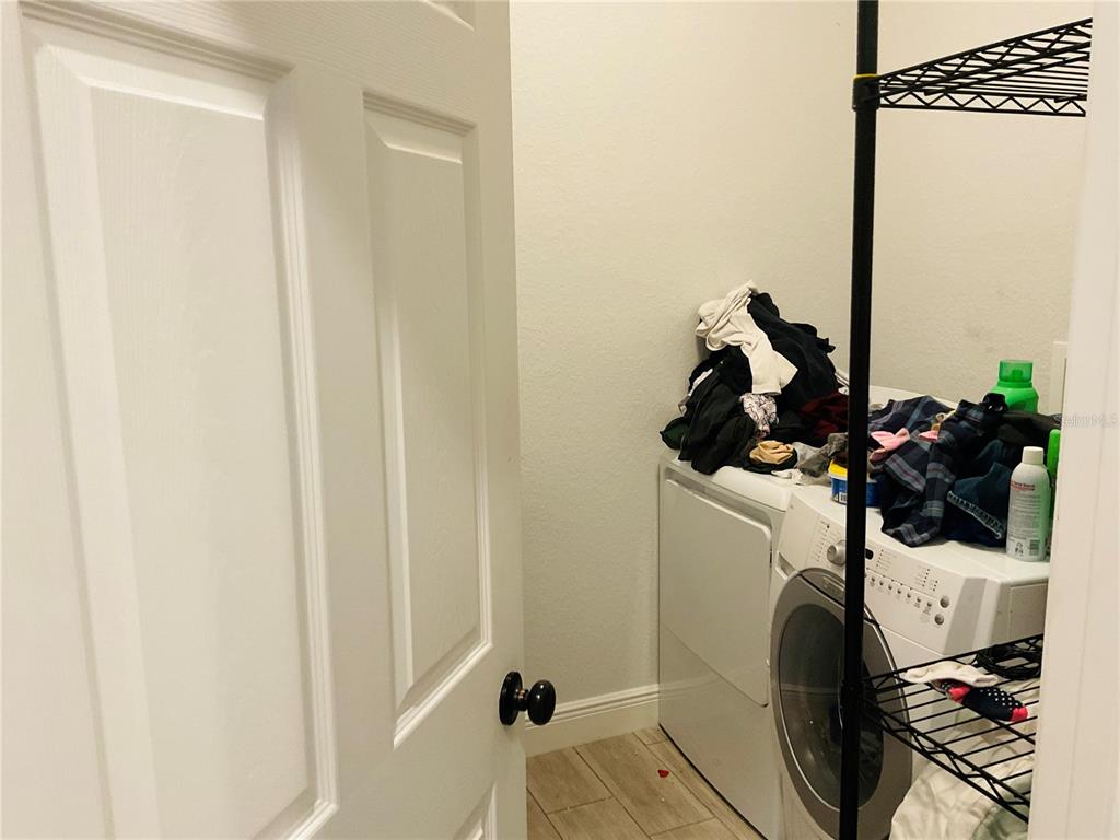 515 5th Street South Dundee, FL 33838 - Photo 67 of 74 a bath room with a sink and a mirror