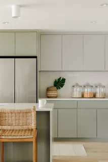 a bathroom with a sink and cabinets