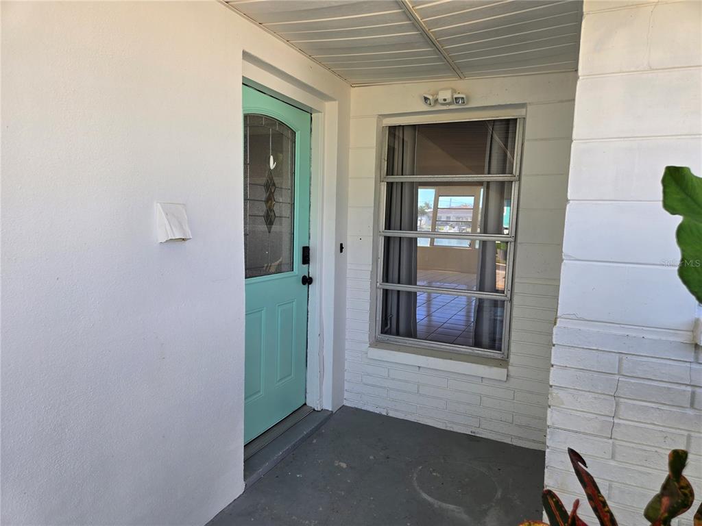 530 Lillian Drive Madeira Beach, FL 33708 - Photo 20 of 56 a view of a front door of the house