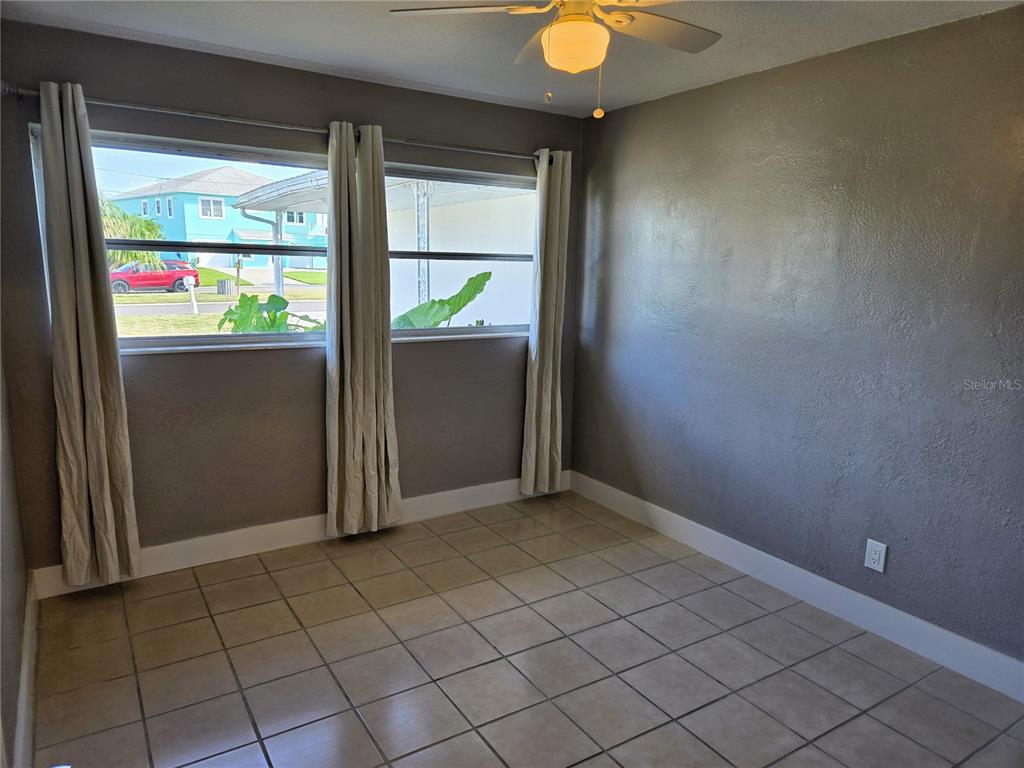 530 Lillian Drive Madeira Beach, FL 33708 - Photo 37 of 56 an empty room that has a window