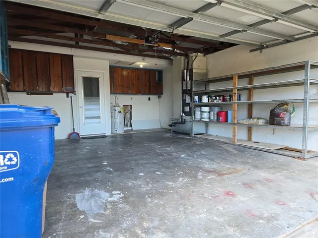 a view of a swimming pool with an outdoor space and seating area