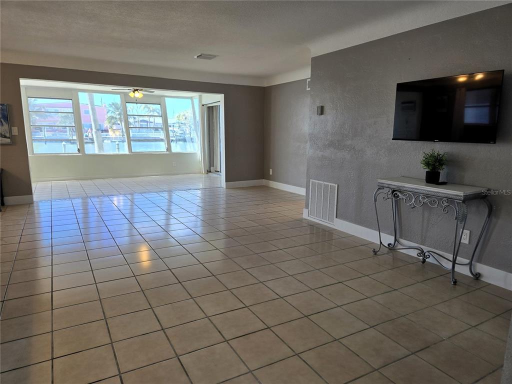 530 Lillian Drive Madeira Beach, FL 33708 - Photo 8 of 56 a view of a livingroom with furniture and window