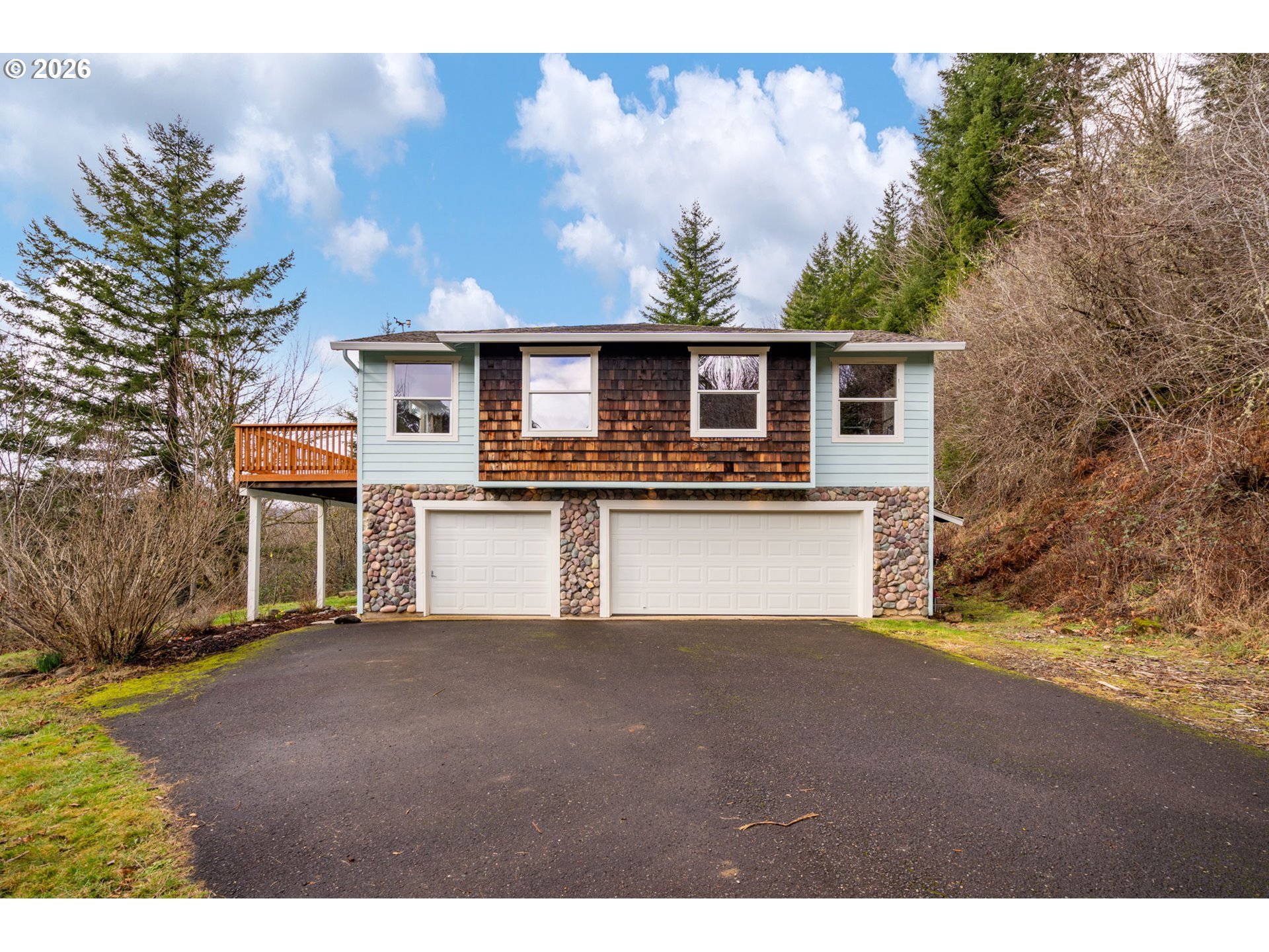 38220 Northeast Sunset Falls Road Yacolt, WA 98675 - Photo 2 of 40 a view of a house with a backyard