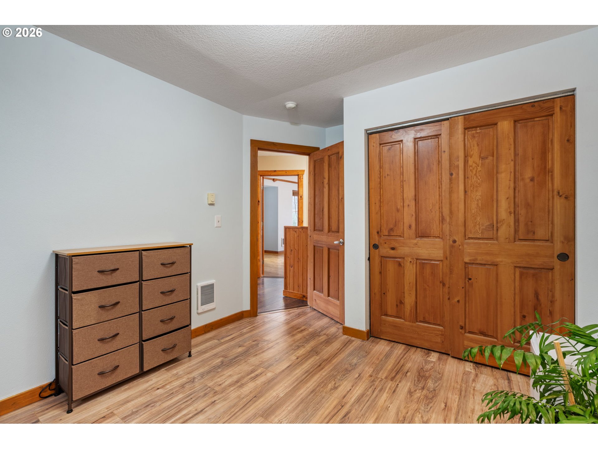 38220 Northeast Sunset Falls Road Yacolt, WA 98675 - Photo 29 of 40 wooden floor and windows in a room