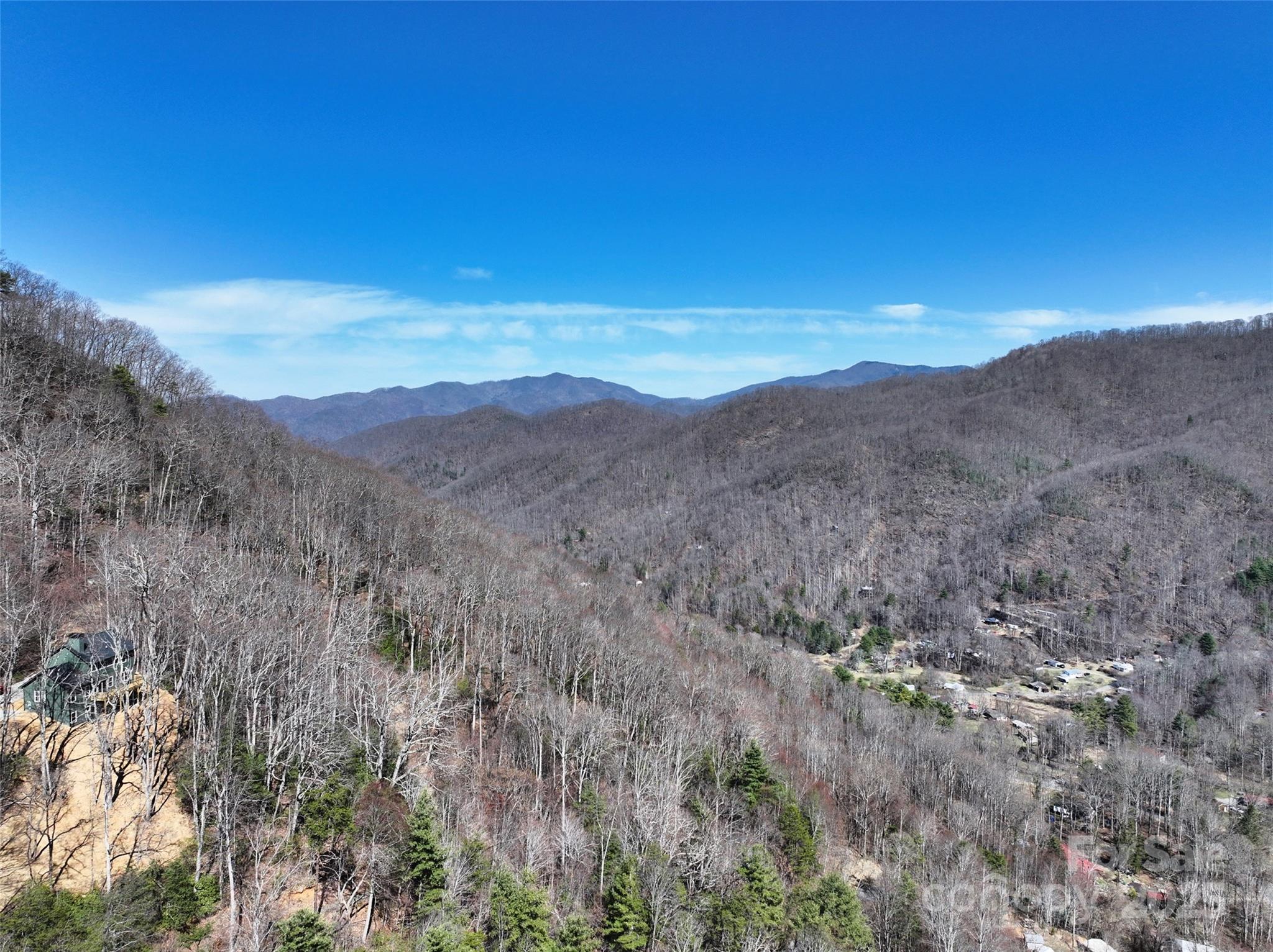 99999 Green Ridge Falls Road, Unit 17 Barnardsville, NC 28709 - Photo 16 of 21 a view of a mountain range with trees in the background