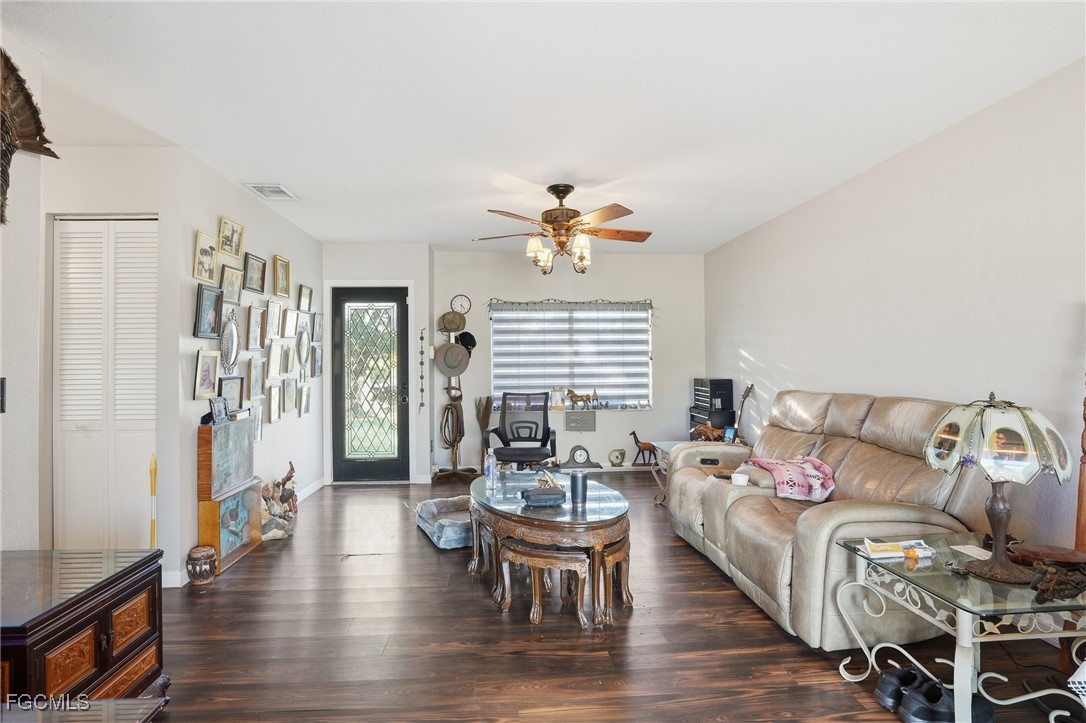 4480 20th Street Northeast Naples, FL 34120 - Photo 4 of 18 a living room with furniture and a large window