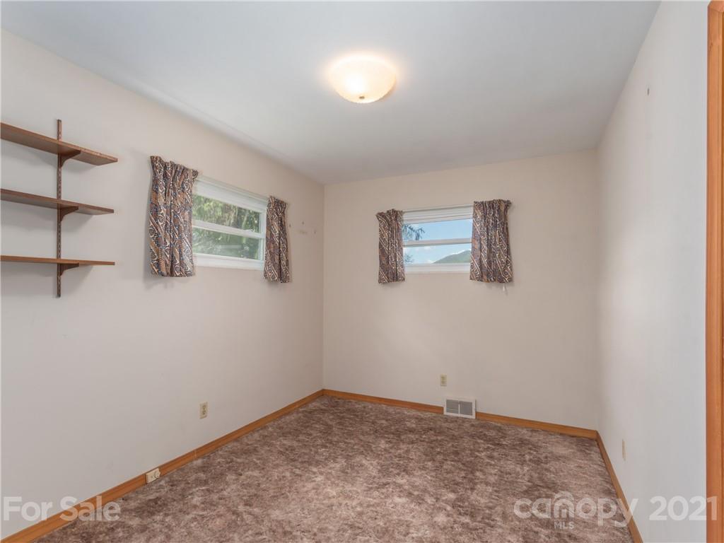 113 Possum Ridge Road Canton, NC 28716 - Photo 14 of 24 a view of empty room with windows