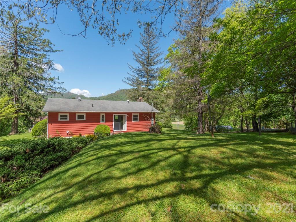 113 Possum Ridge Road Canton, NC 28716 - Photo 19 of 24 a view of a house with a big yard