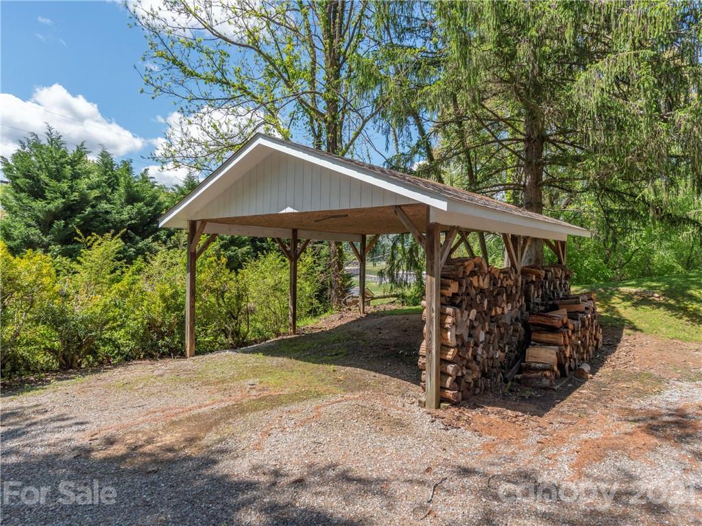 113 Possum Ridge Road Canton, NC 28716 - Photo 23 of 24 a view of a barn with a yard