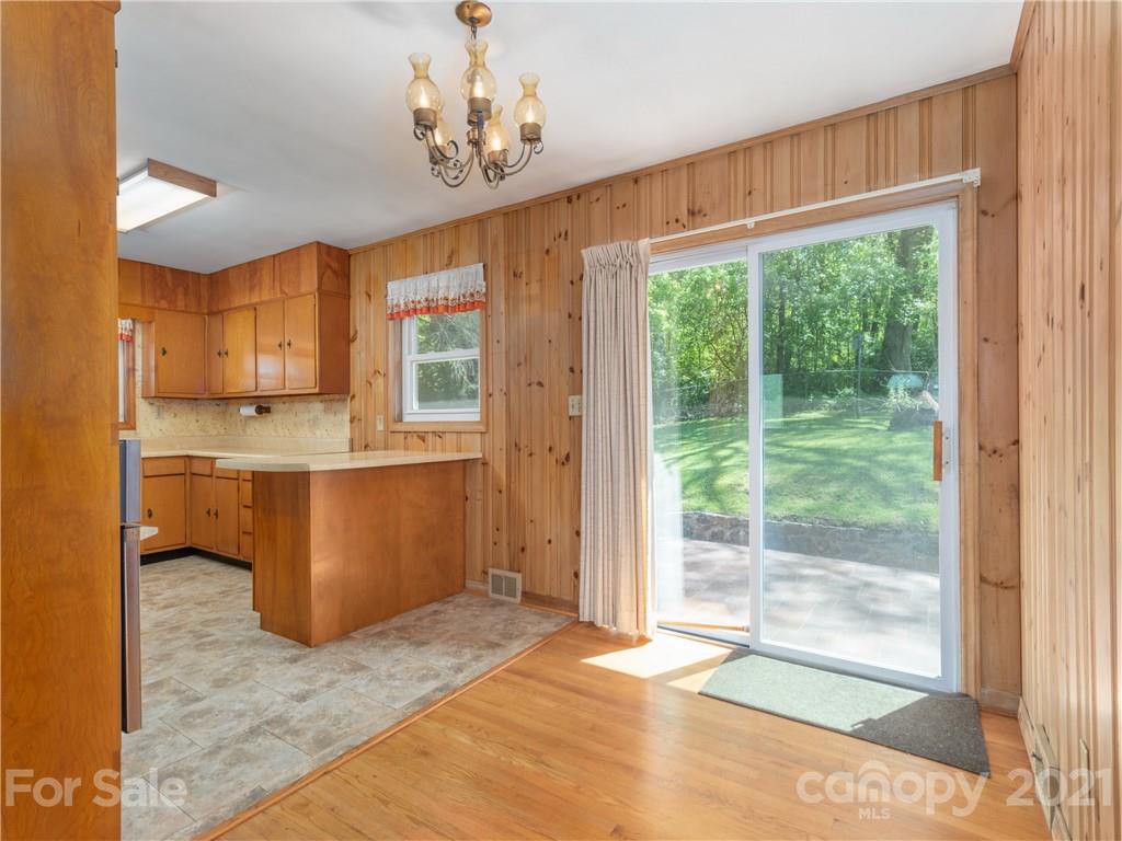113 Possum Ridge Road Canton, NC 28716 - Photo 5 of 24 a view of a kitchen with a sink and a window