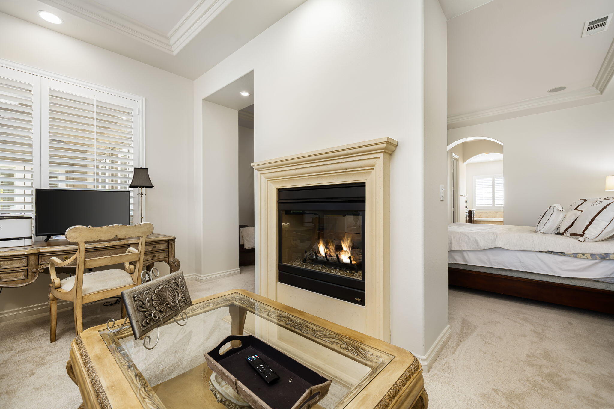 52455 Whispering Way La Quinta, CA 92253 - Photo 11 of 18 a living room with furniture and a fireplace