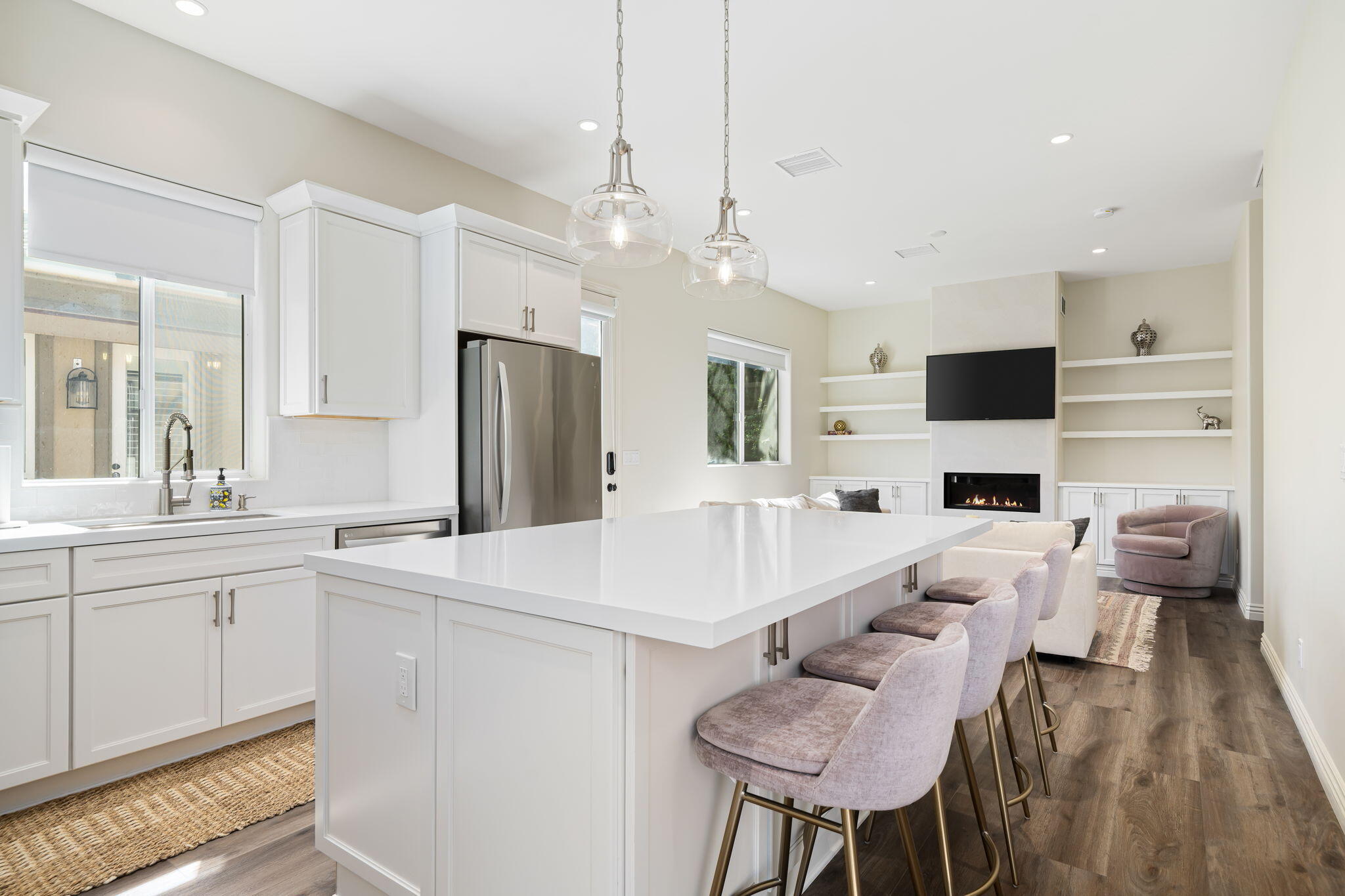 52455 Whispering Way La Quinta, CA 92253 - Photo 16 of 18 a view of living room kitchen with a sink and a couch