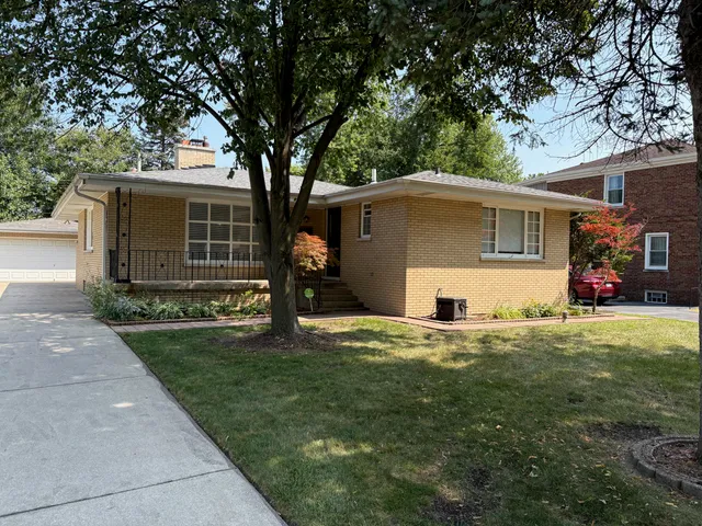 a house view with a garden space