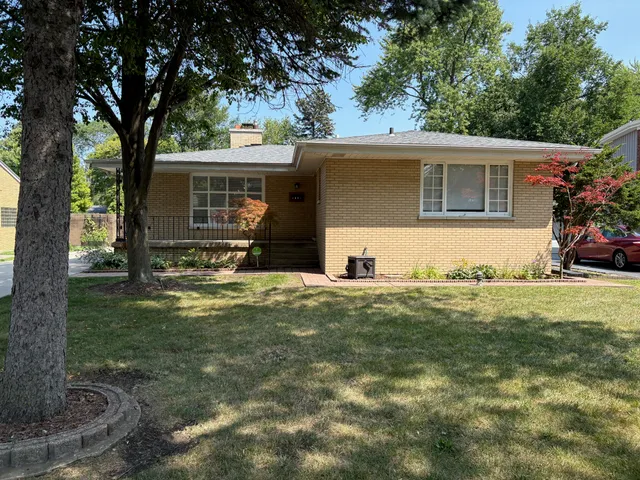 a front view of house with yard