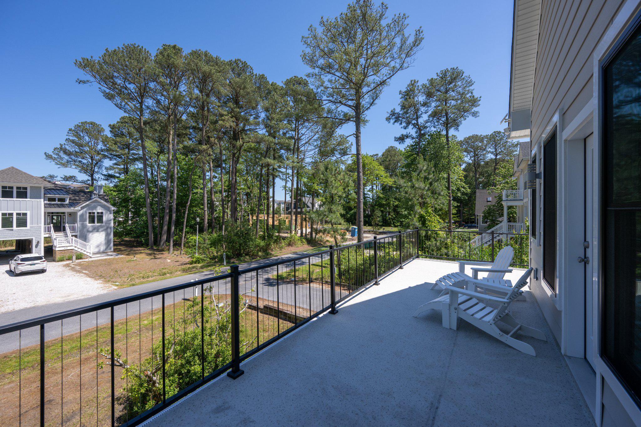 402 Salt Pond Road Bethany Beach, DE 19930 - Photo 31 of 55 Serene balcony off of the primary bedroom.