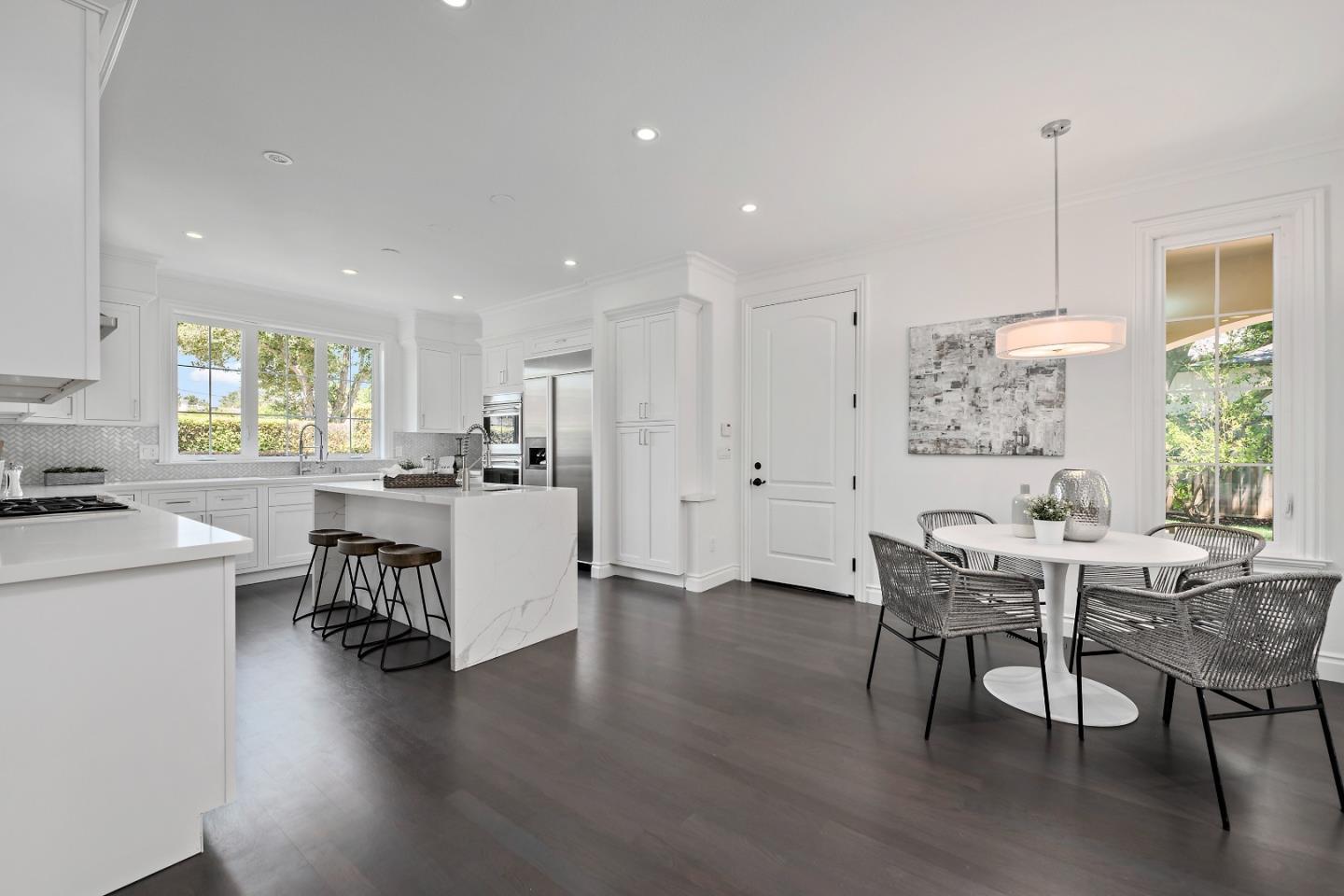 151 Giffin Road Los Altos, CA 94022 - Photo 11 of 44 a kitchen with a table and chairs in it
