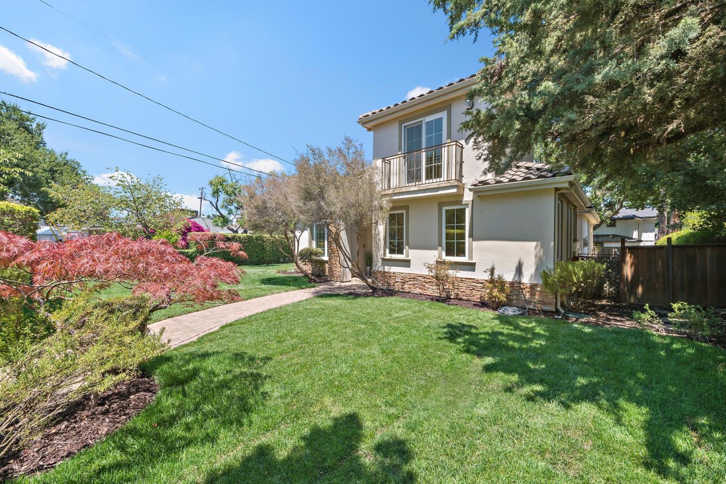 151 Giffin Road Los Altos, CA 94022 - Photo 3 of 44 a view of a house with backyard sitting area and garden