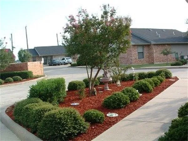 a house view with a garden space