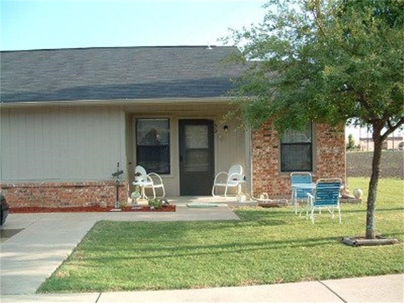 108 8th Street Venus, TX 76084 - Photo 4 of 6 a view of a house with backyard porch and sitting area