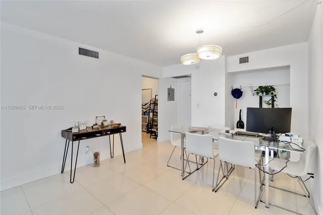 a bathroom with a shower a toilet and a sink