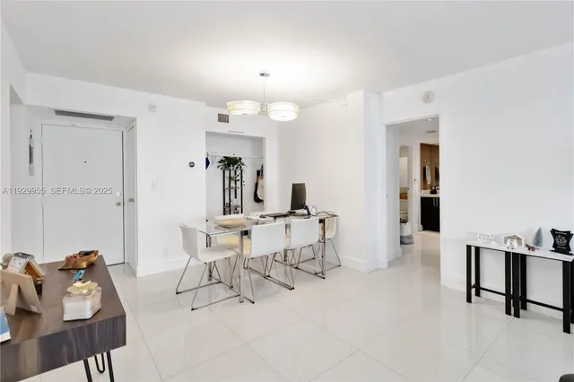 a spacious bathroom with a sink double vanity and tub