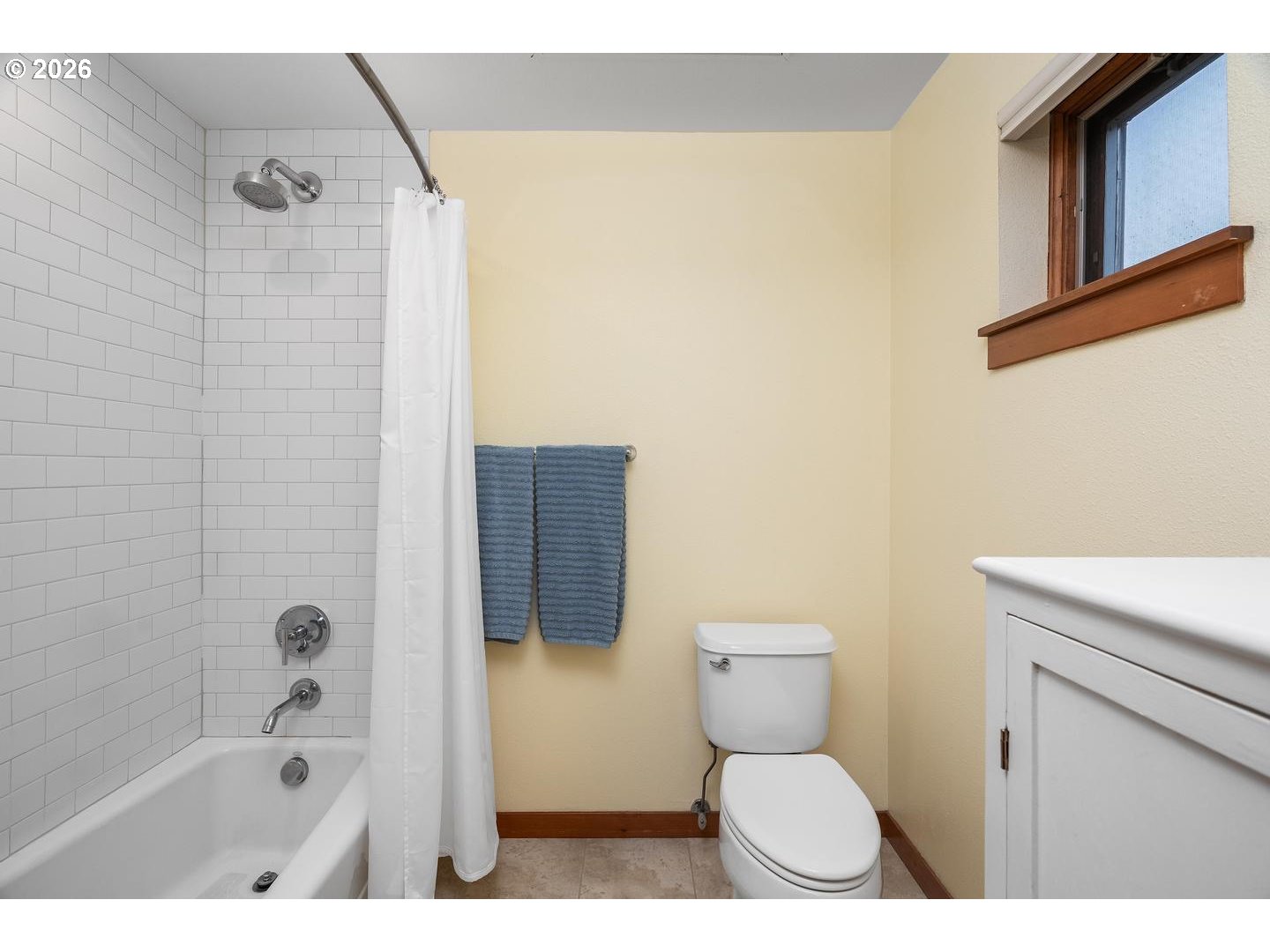 7910 Southwest 31st Avenue, Unit 203 Portland, OR 97219 - Photo 12 of 27 a bathroom with a toilet and a shower