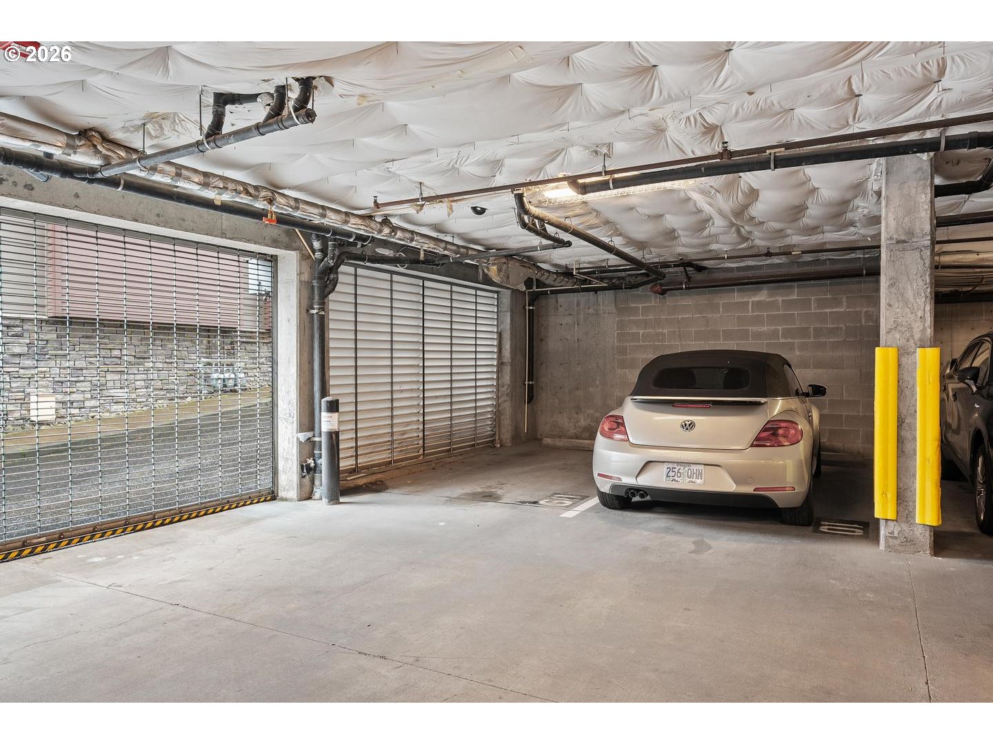 7910 Southwest 31st Avenue, Unit 203 Portland, OR 97219 - Photo 16 of 27 a view of parking garage