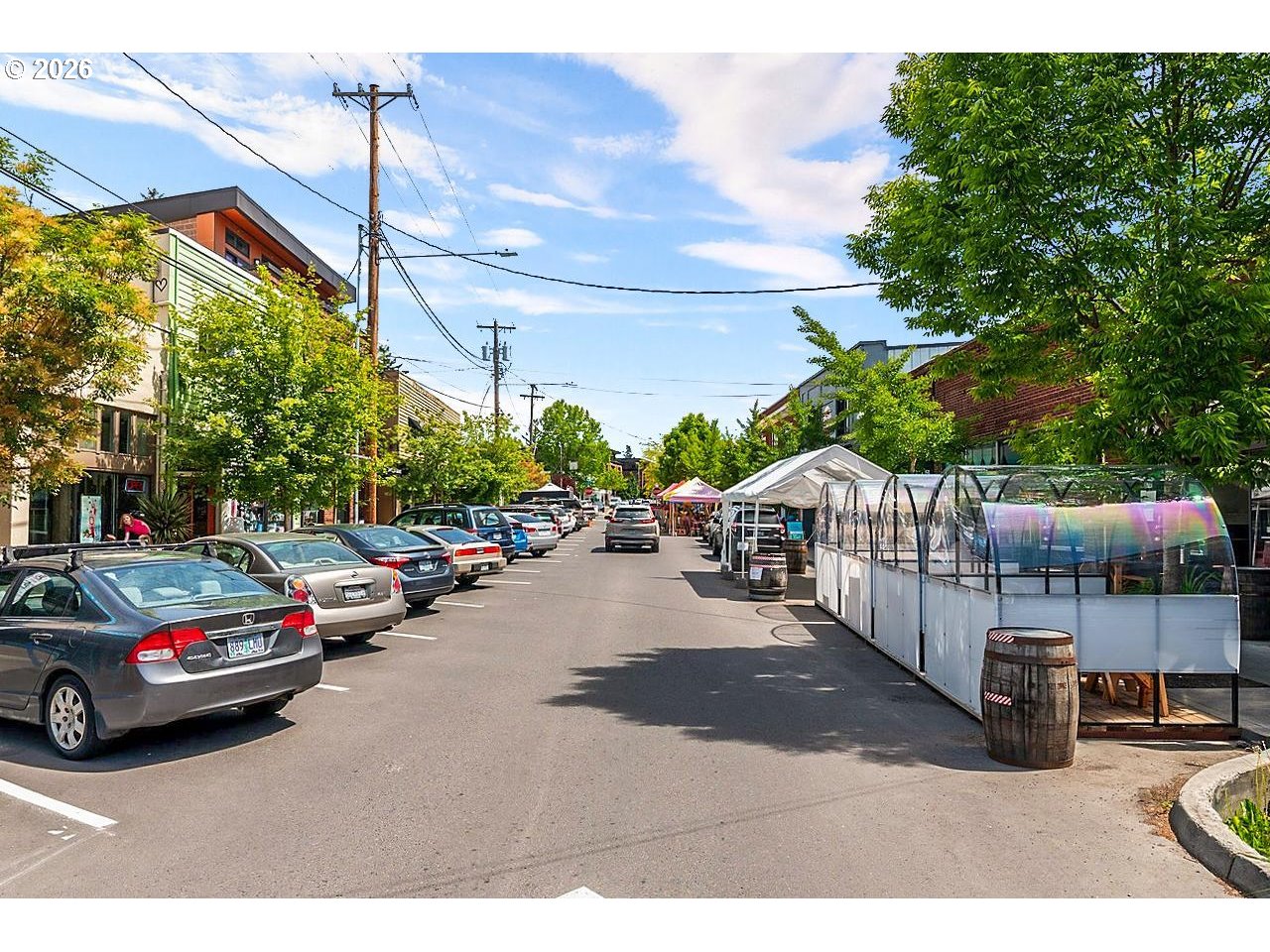 7910 Southwest 31st Avenue, Unit 203 Portland, OR 97219 - Photo 26 of 27 a view of a cars park in front of a building