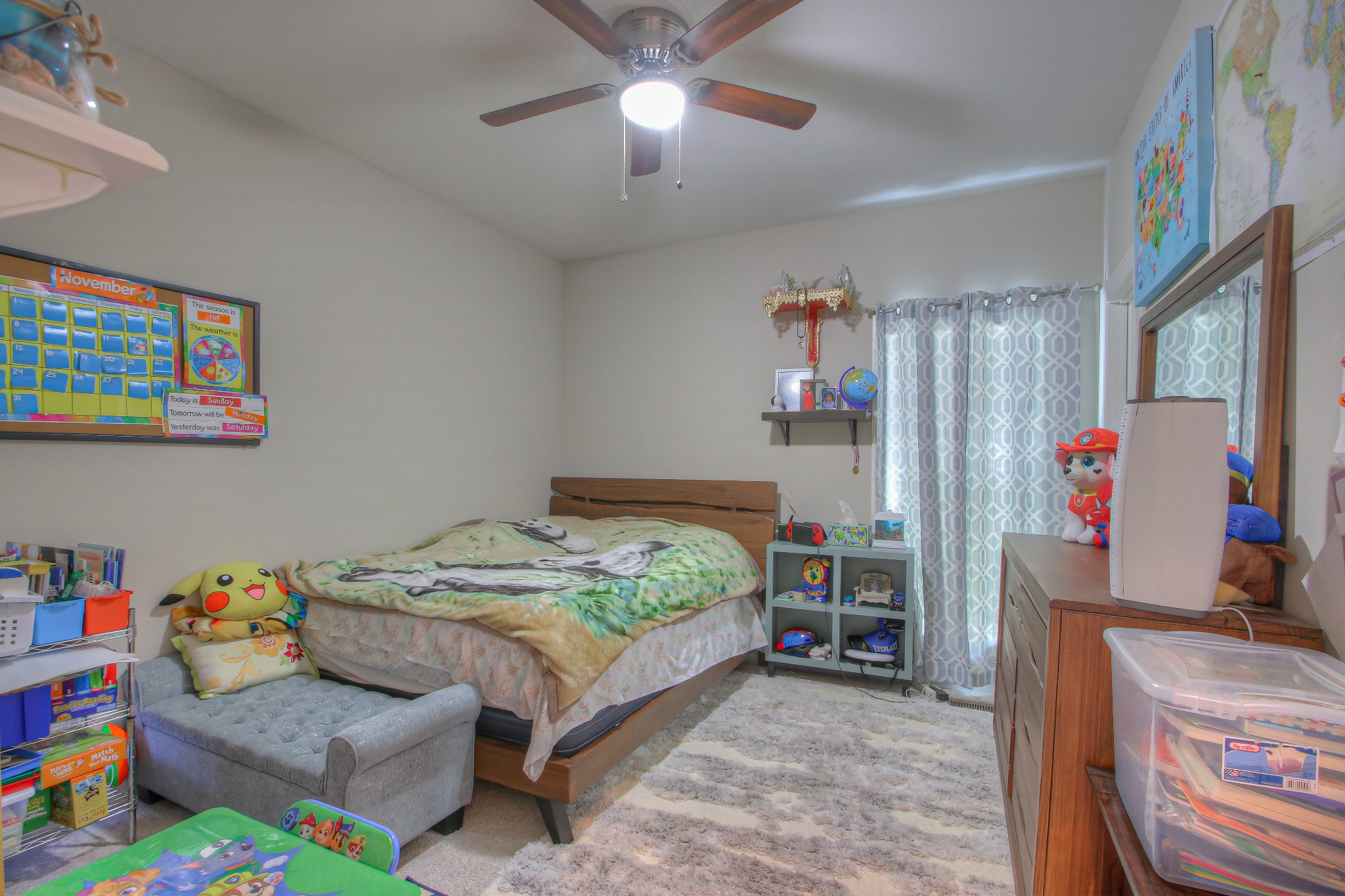 121 Flat Woods Road Lebanon, TN 37090 - Photo 17 of 39 a bedroom with a bed and a window