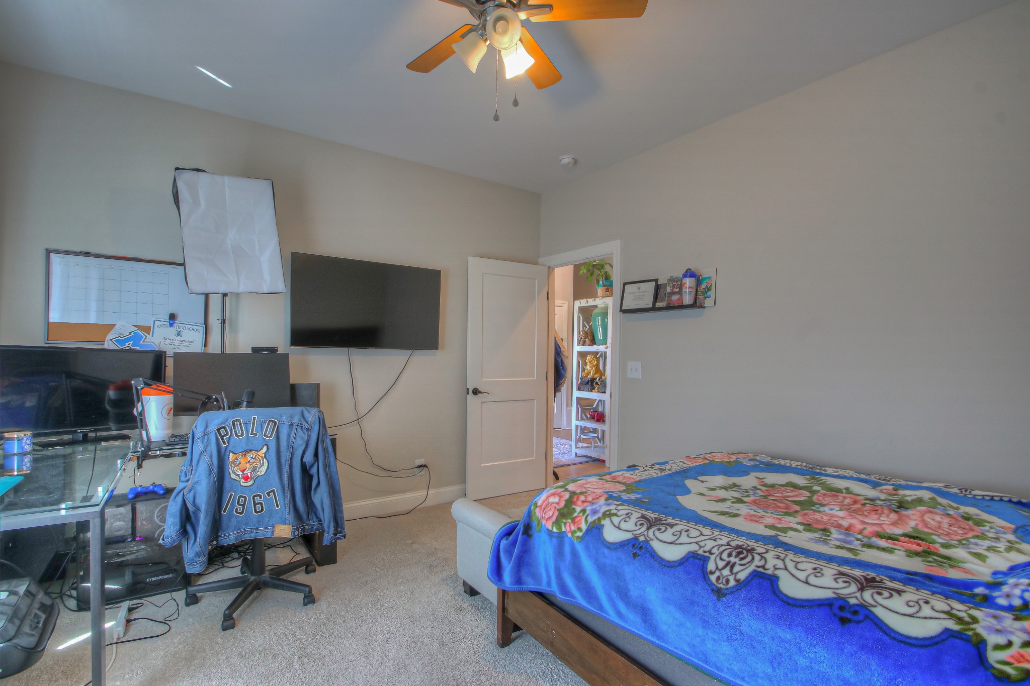 121 Flat Woods Road Lebanon, TN 37090 - Photo 20 of 39 a bedroom with bed and tv