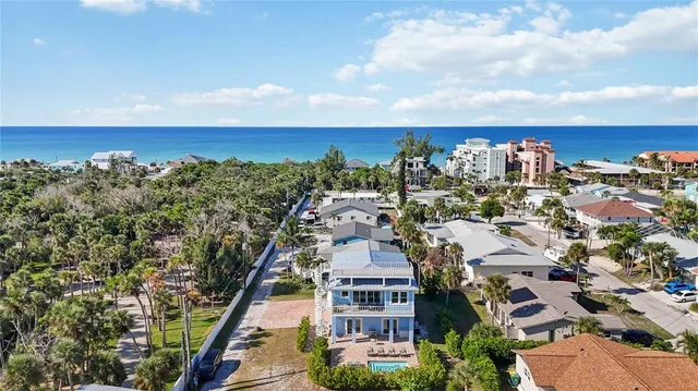 an aerial view of a city with lake view