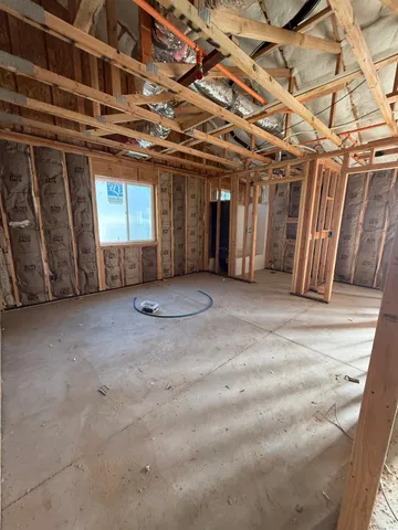 a view of a room with wooden walls