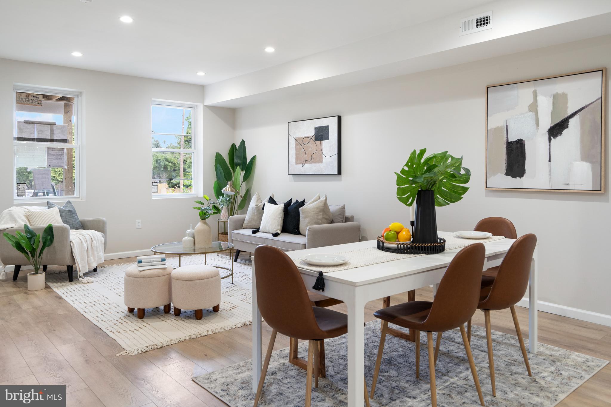 4011 Ridgewood Avenue Baltimore, MD 21215 - Photo 13 of 35 a living room with furniture and wooden floor