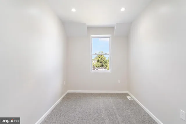 an empty room with an entryway