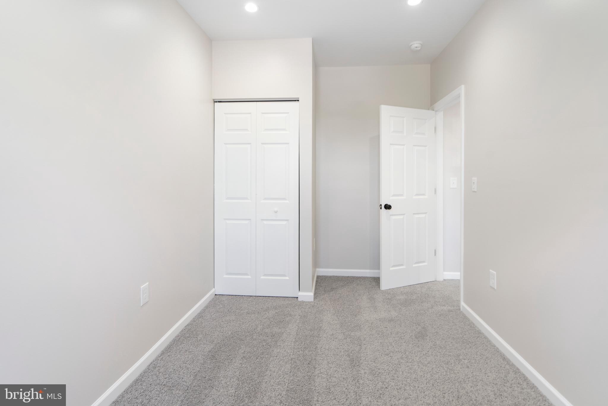 4011 Ridgewood Avenue Baltimore, MD 21215 - Photo 34 of 35 an empty room with an entryway