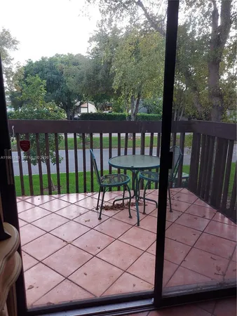 a view of a bench in a yard