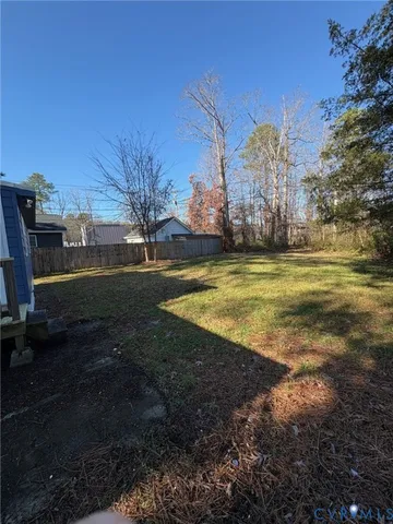 a view of a yard with an outdoor space