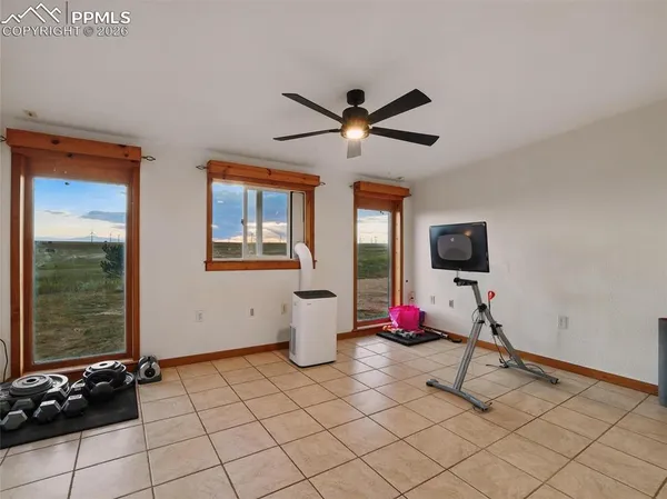 a view of a hallway with a white walls