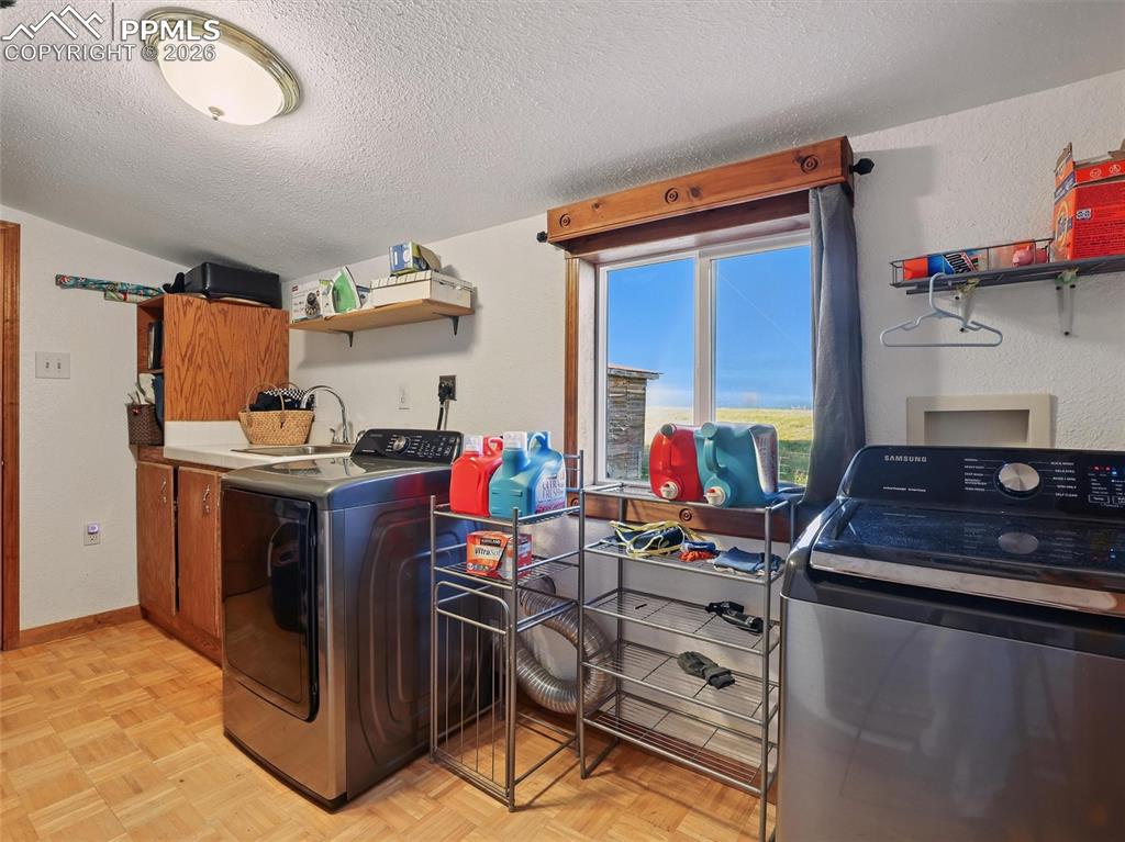 6615 Mulberry Road Calhan, CO 80808 - Photo 36 of 47 a work place with table and chairs