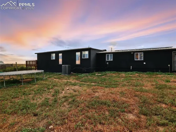 a view of a city with an ocean