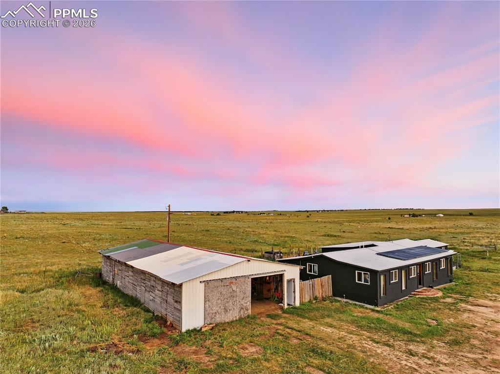 6615 Mulberry Road Calhan, CO 80808 - Photo 45 of 47 a view of a ocean with a building in the background