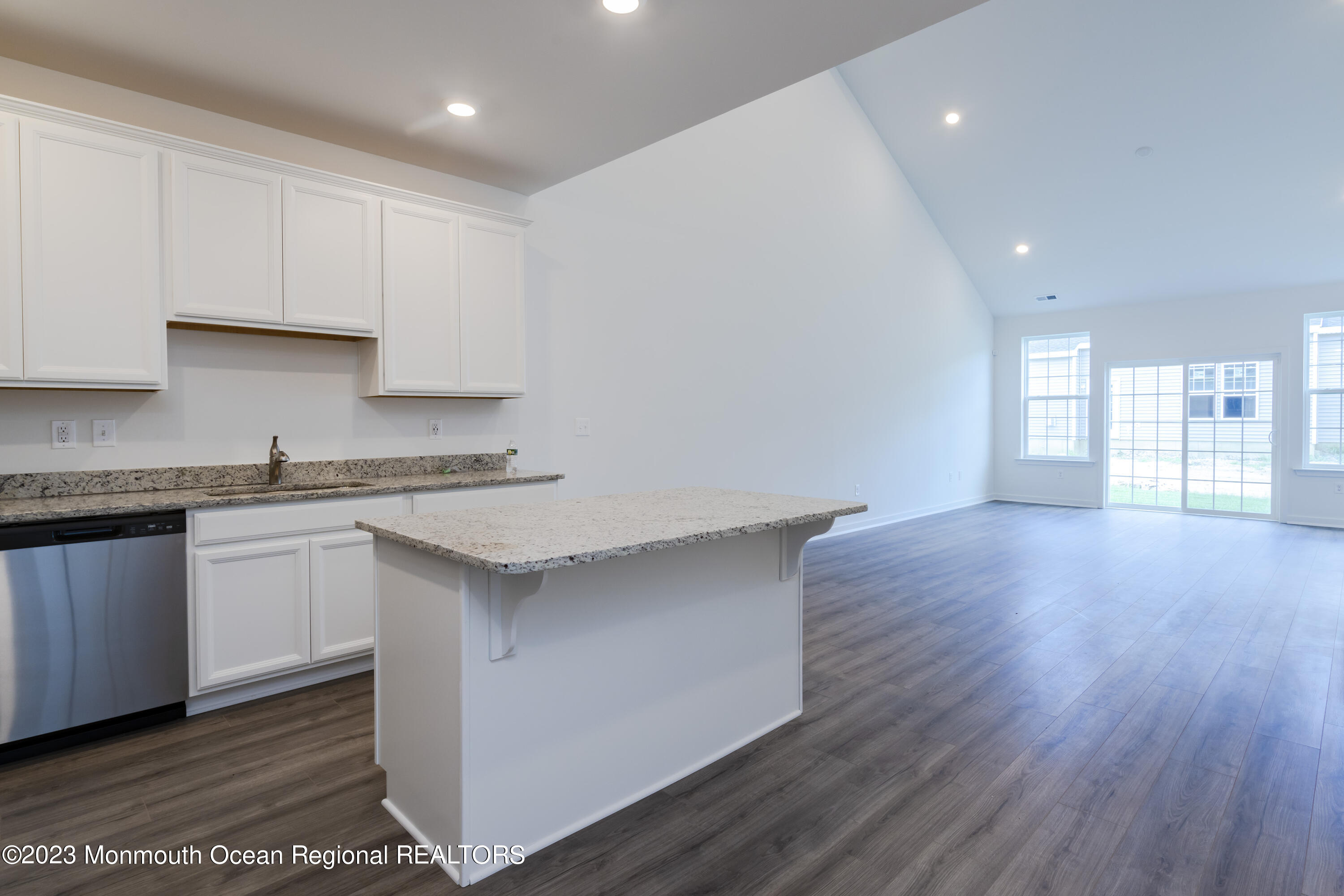 23 Gulfstream Road New Egypt, NJ 08533 - Photo 4 of 34 a kitchen with a wooden floor and window