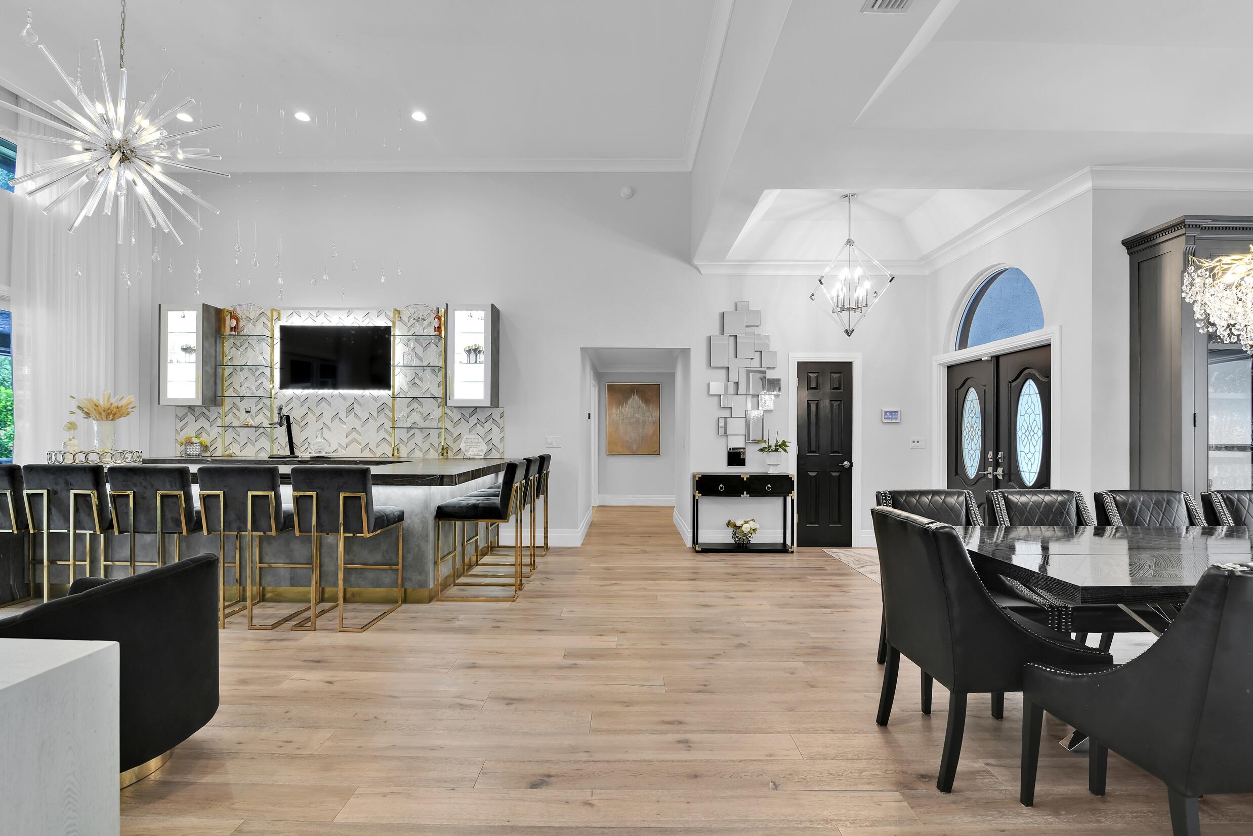 21082 North Sweetwater Lane Boca Raton, FL 33428 - Photo 11 of 75 a view of a a dining room with furniture and wooden floor