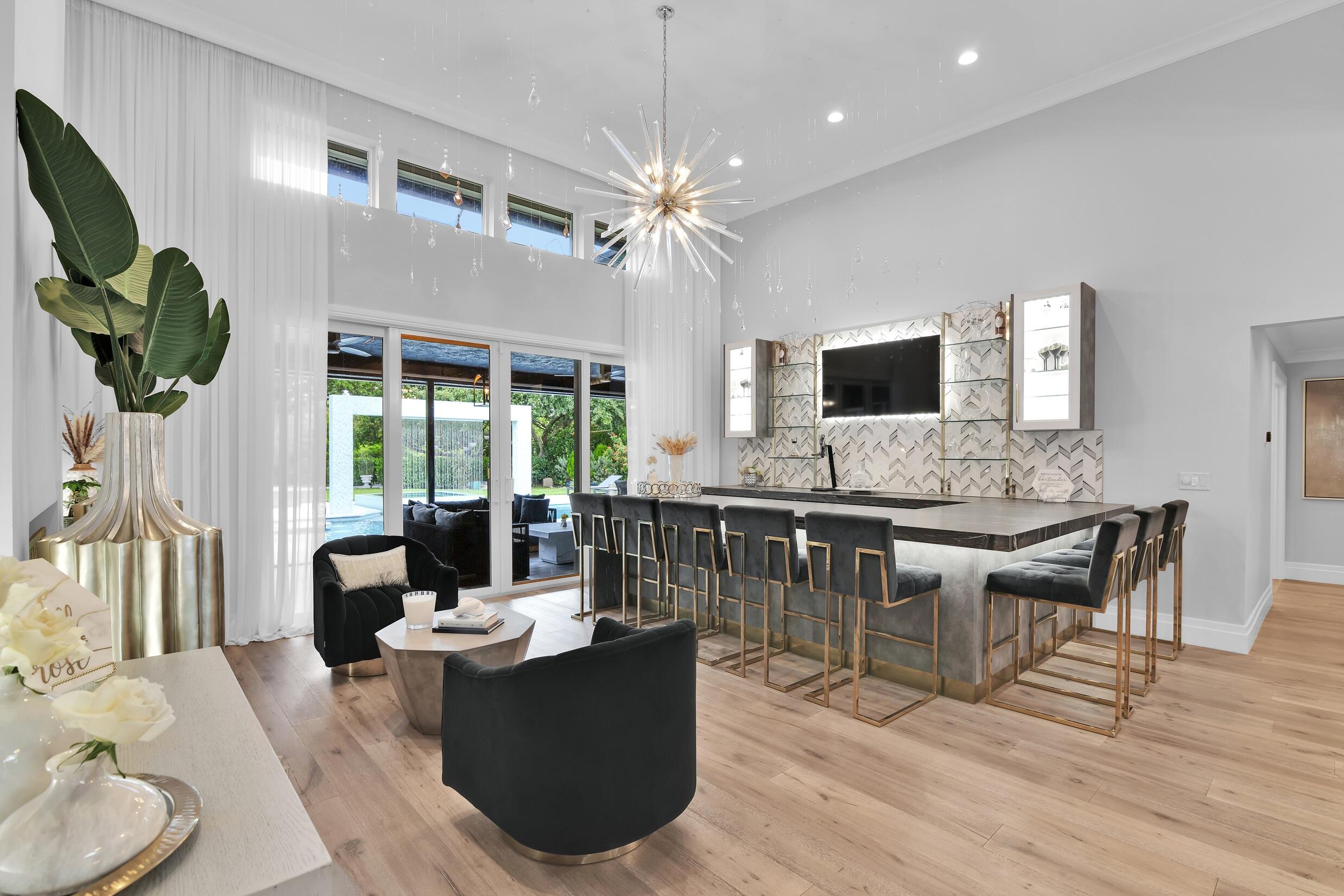 21082 North Sweetwater Lane Boca Raton, FL 33428 - Photo 12 of 75 a view of a dining room with furniture window and wooden floor