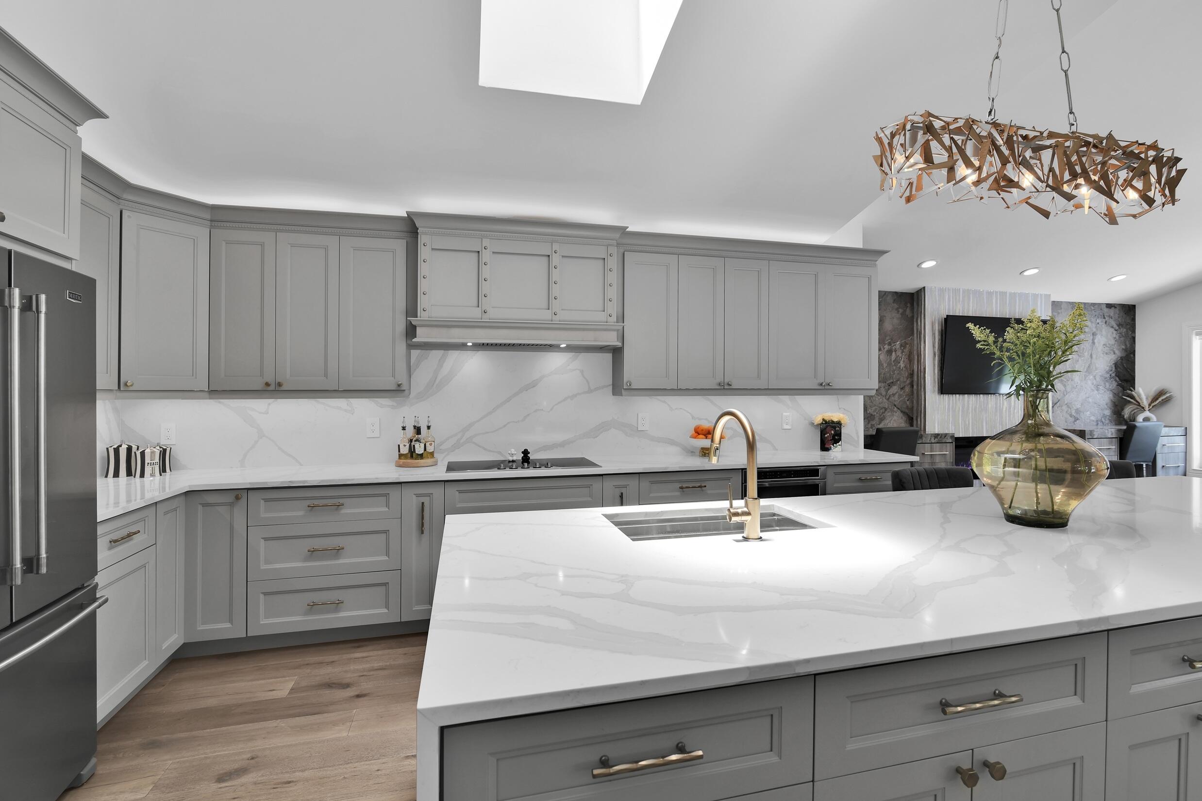 21082 North Sweetwater Lane Boca Raton, FL 33428 - Photo 16 of 75 a kitchen with cabinets a sink and white appliances